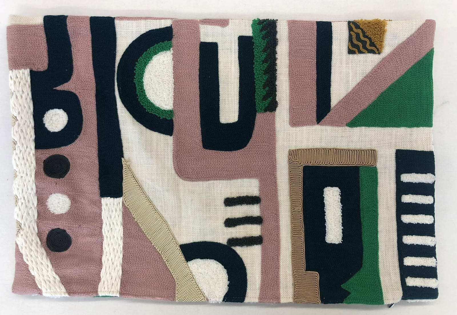 Cushion cover with graphic embroidery in pink, green and navy